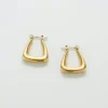 Aretes de aro triangulares dorados Admiral Row