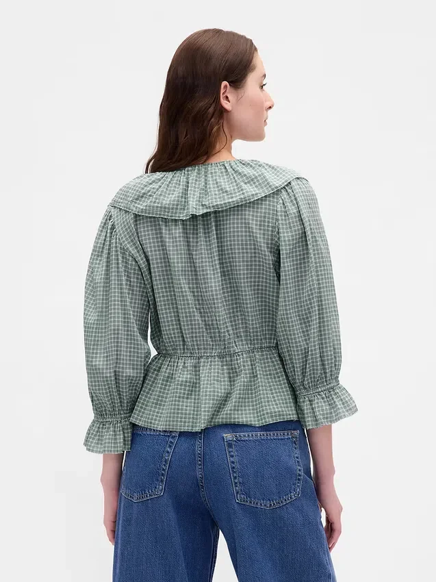 Blusa con cuello en V y volantes