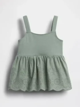 Blusa con dobladillo de ojales para bebés y niños pequeños