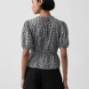 Blusa con lazo en la cintura