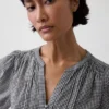Blusa con lazo en la cintura