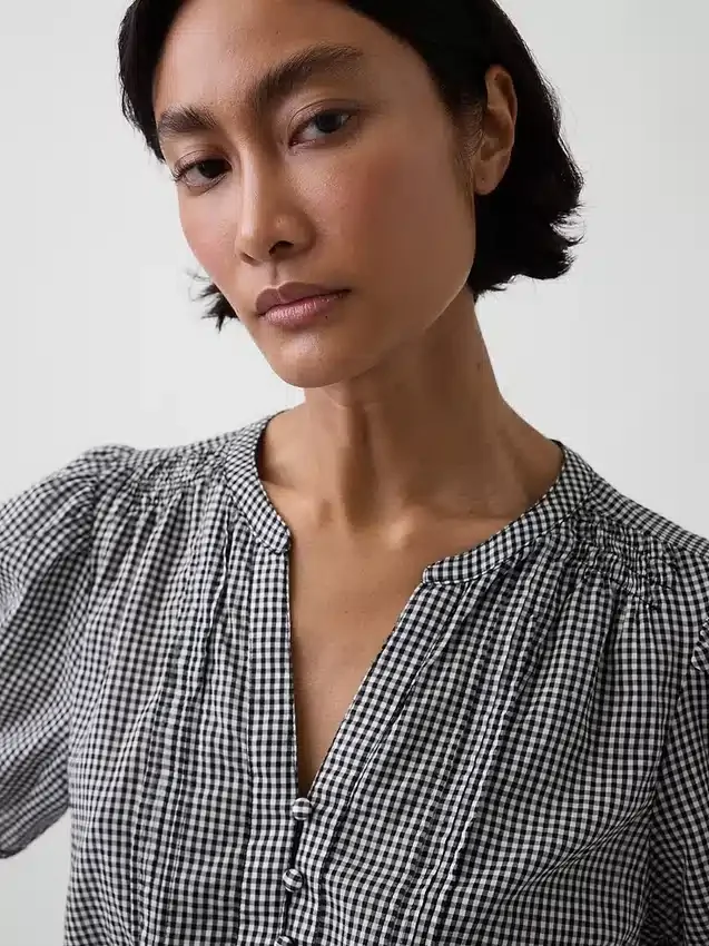 Blusa con lazo en la cintura