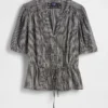Blusa con lazo en la cintura