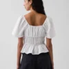 Blusa con peplum y cuello cuadrado