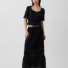 Blusa con peplum y ribete de encaje