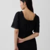 Blusa con peplum y ribete de encaje