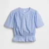 Blusa corta con peplum y cierre frontal de botones