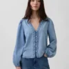 Blusa de mezclilla con mangas abullonadas