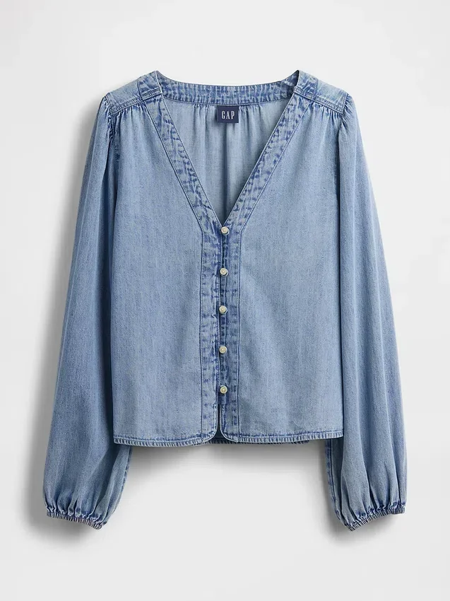 Blusa de mezclilla con mangas abullonadas