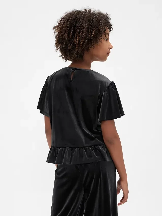 Blusa de terciopelo con peplum para niños
