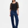 Blusa de tul transparente con bordados