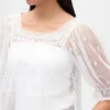 Blusa de tul transparente con bordados