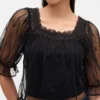 Blusa de tul transparente con bordados