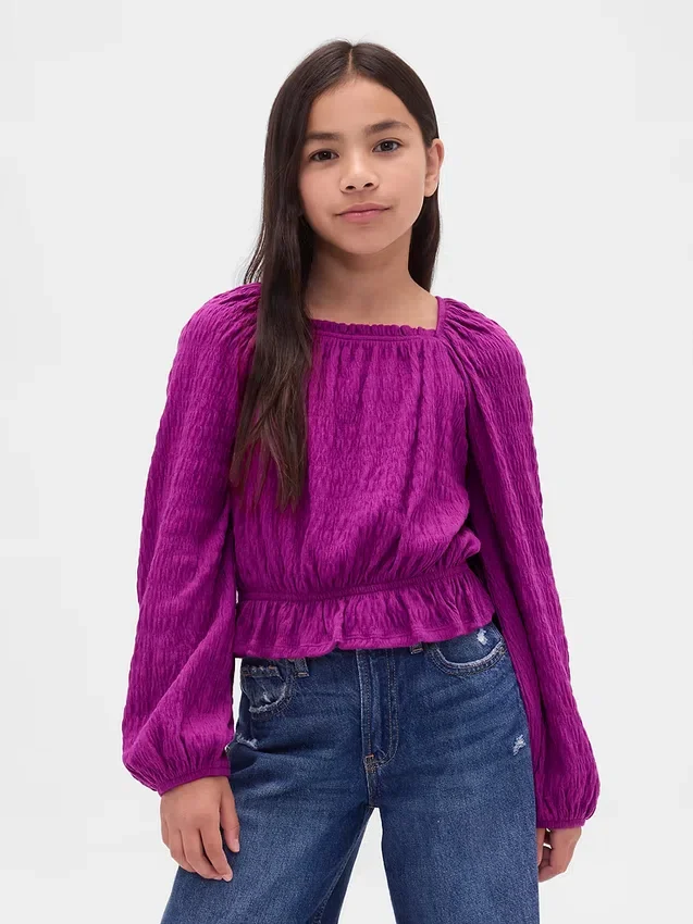 Blusa infantil con peplum arrugado