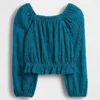 Blusa infantil con peplum arrugado