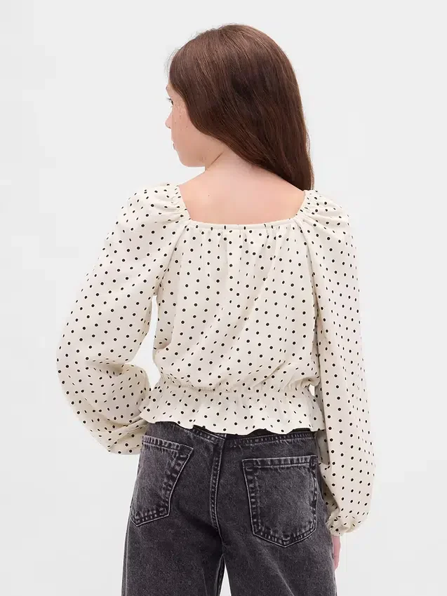 Blusa infantil con peplum arrugado