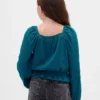 Blusa infantil con peplum arrugado