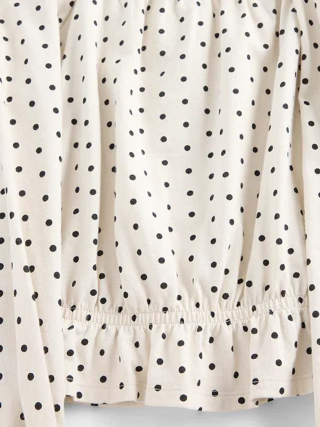 Blusa infantil con peplum arrugado