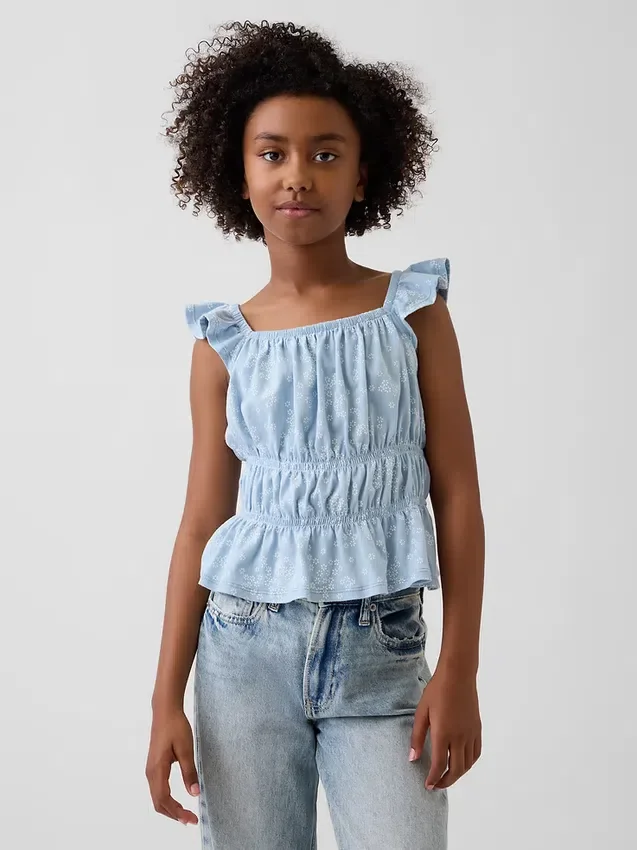 Blusa infantil con peplum, mangas con volantes y fruncido