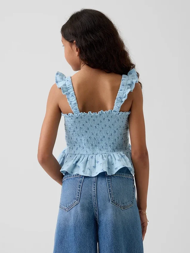 Blusa infantil de gasa de algodón con peplum fruncido
