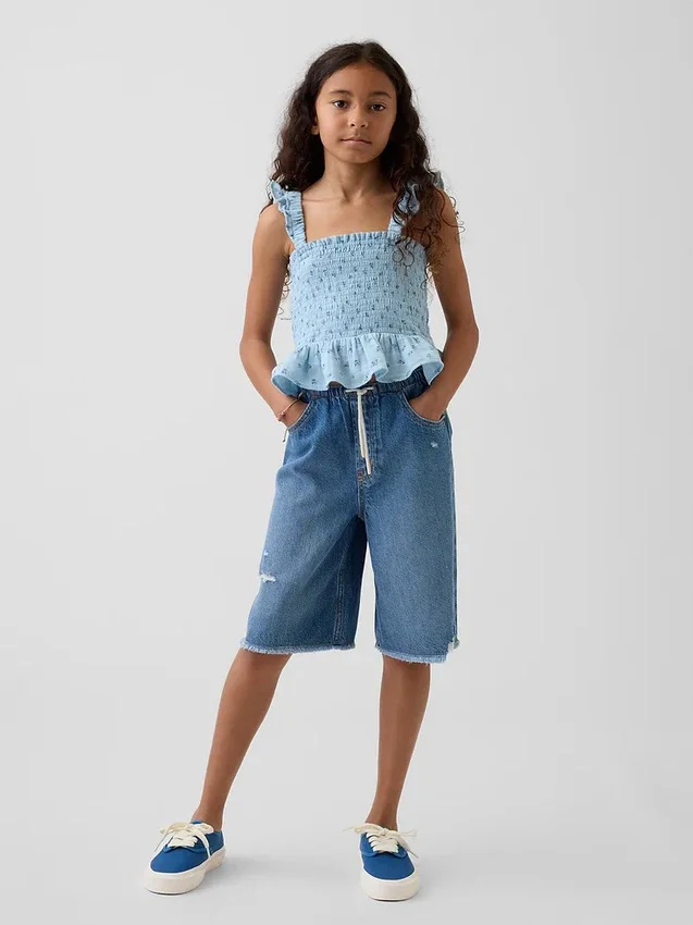 Blusa infantil de gasa de algodón con peplum fruncido