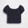 Blusa infantil de mangas abullonadas con ribete de encaje
