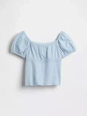 Blusa infantil de mangas abullonadas con ribete de encaje