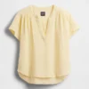 Blusa oversize de gasa de algodón con cuello abierto