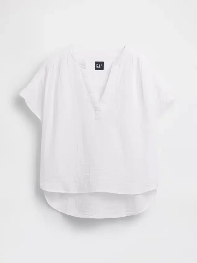Blusa oversize de gasa de algodón con cuello abierto