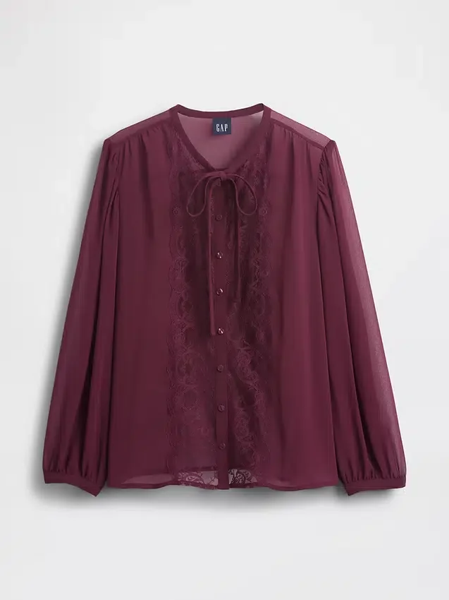 Blusa transparente con inserciones de encaje reciclado y cuello con lazo