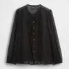 Blusa transparente con inserciones de encaje reciclado y cuello con lazo
