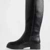 Botas altas de cuero vegano con suela de tacos