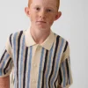 Camisas de jerséu infantil de rayas en crochet