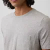 Camiseña con bolsillo de algodón orgánico para adultos