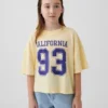 Camiseña oversize de corte cuadrado con logotipos de estados para niños