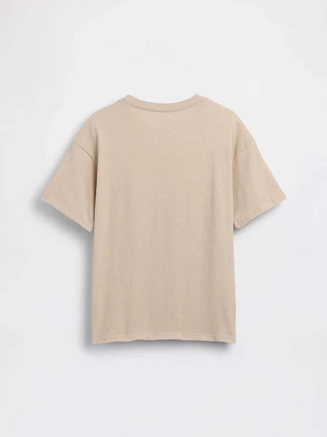 Camiseta infantil holgada con diseño gráfico