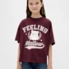 Camiseta infantil oversize con diseño gráfico