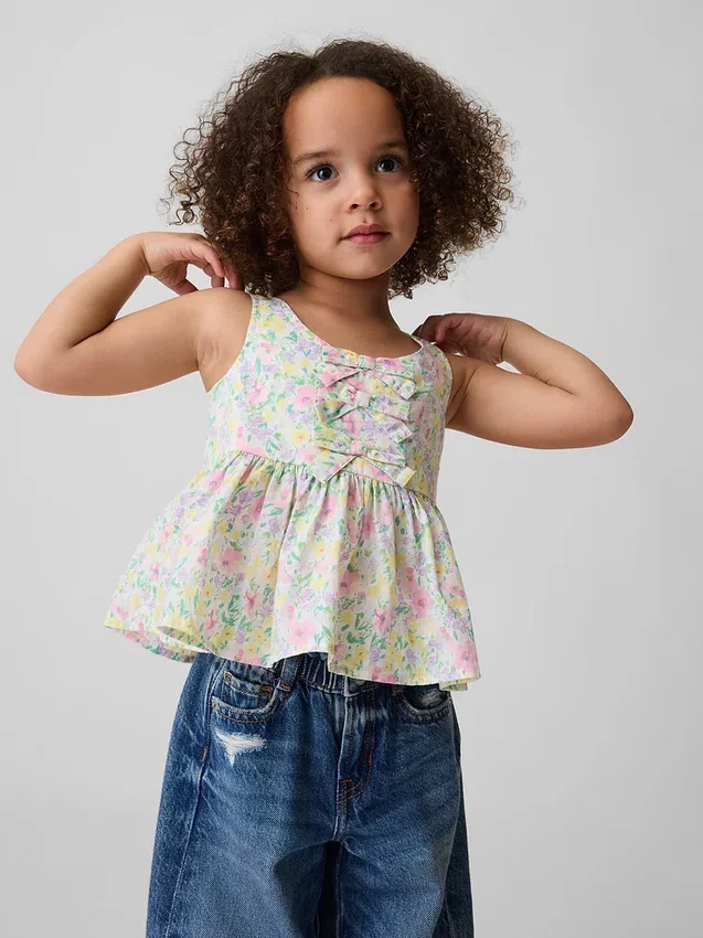 Camiseta sin mangas con peplum y moño para bebés y niños pequeños