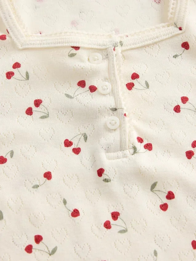 Camiseta tipo Henley de punto calado para bebés y niños pequeños