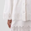 Chaqueta tipo camisa holgada con dobladillo de ojales