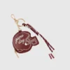 Colgante para bolso con forma de casco de Shiraleah