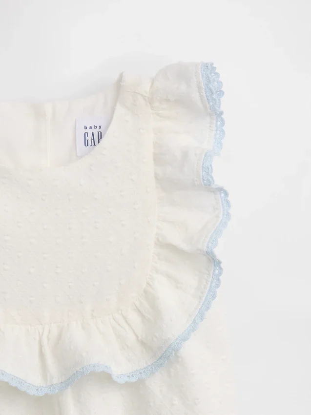 Conjunto de babero con ojales para bebé