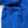 Consigue la chaqueta de trabajo holgada azul