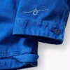 Consigue la chaqueta de trabajo holgada azul
