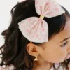 Diadema con moño de tul y estampado floral delicado «Sweet Wink»