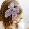 El juego de diademas con moño Abigail