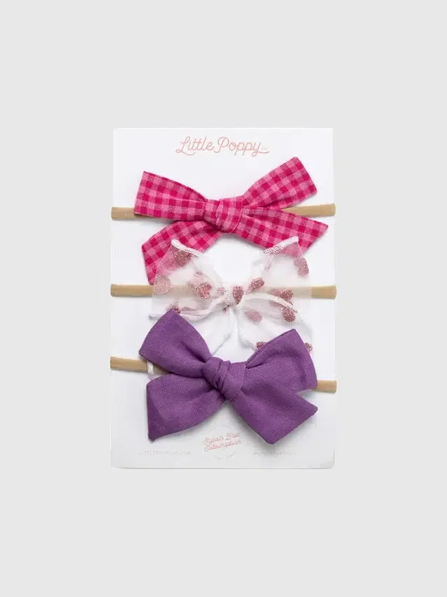 El juego de diademas con moños Taylor