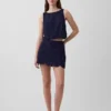Faldita-pantalón mini con ojales