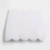 Faldita-pantalón mini con ojales
