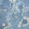 Faldón de mezclilla con estampado floral para niños